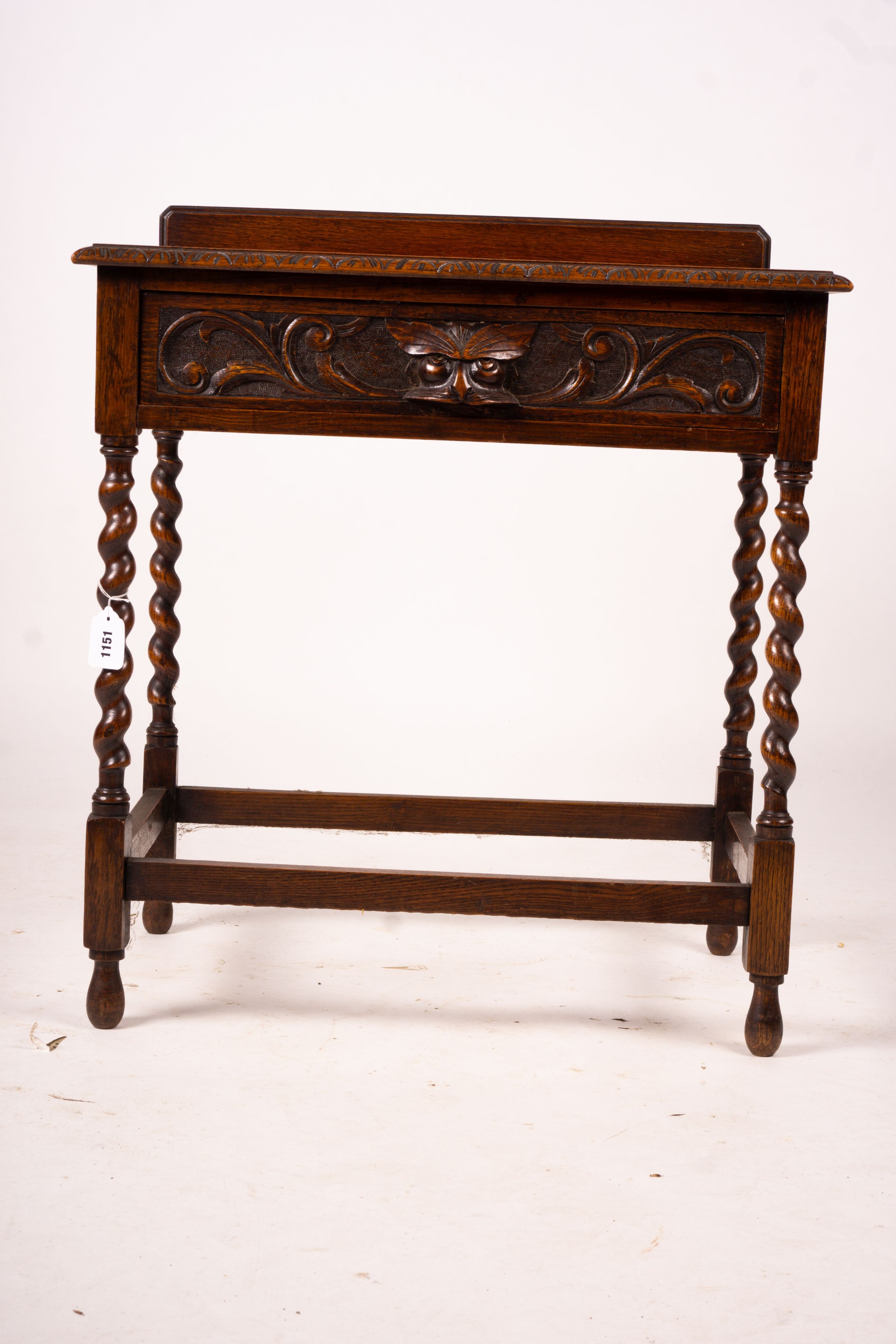 An early 20th century Flemish carved oak side table, W.69cm D.46cm H.77cm